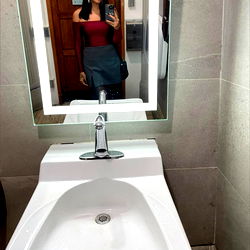 Miss Cordova in the Mirror, Bathroom
