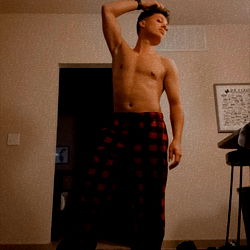 Aaron, OnlyFans Model, Striking a Pose in His Living Room