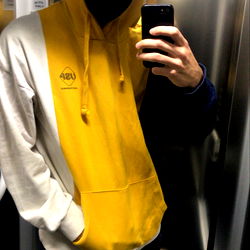 Albertocomas, From Australia, Strikes a Fashionable Pose in a Modern Elevator