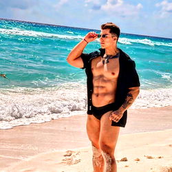 OnlyFans Model Ezequiel on Beach Photoshoot