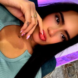 Onlyfans Model Posing with Finger on Chin