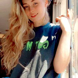 Ali Martini, an Onlyfans Model, Poses for a Window Photo