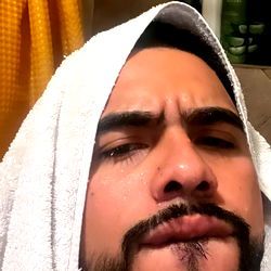 Bearded Man with Mustache, Facial Hair, and Towel