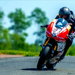 Racer at High Speed on Track