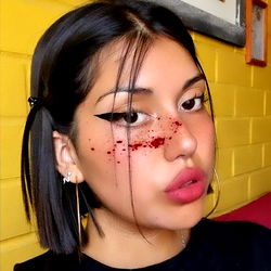 Yohanna, 23-year-old woman with pink hair and bold makeup in Santiago