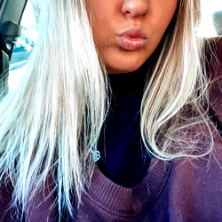 Cass's Vivid Blonde Hair Stands Out in Her Onlyfans Photos