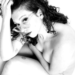 Peach OnlyFans Model in Shirt, Sunglasses, and Tattoo