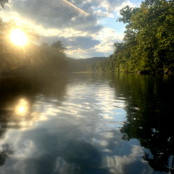 Serene Sunrise on a Calm Lake