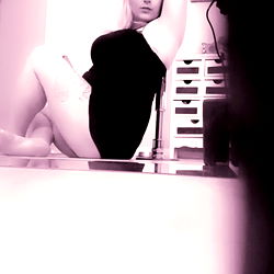 Model in a mirror with the onlyfans username