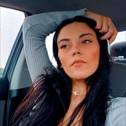 Model in Car Selfie, Captioned 'Rockford Illinois' with Fans Model Name