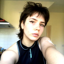 Person in a sports outfit taking a selfie