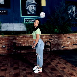 Alyssa Strikes a Pose in the Sports Bar