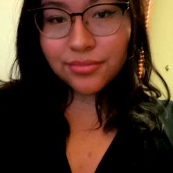 Young Woman in Black V-Neck