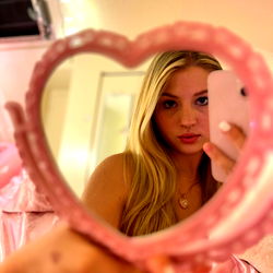 Aves, a Model Reflecting in a Mirror