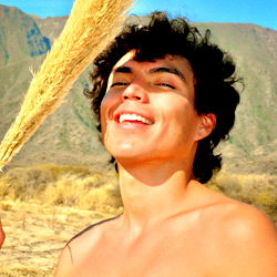 Model pose in front of a backdrop