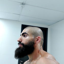 Fit and Muscular Arab Man with Full Beard in Gym, Brazilian Style