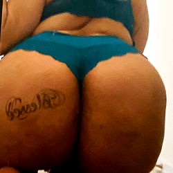 Full-figured Woman in Bikini Embracing Her Curves,