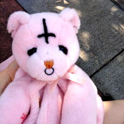 A playful stuffed teddy bear