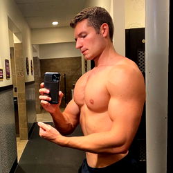 Fitness Enthusiast Showing Off His Muscles