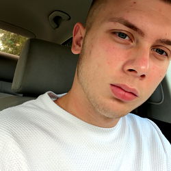 Andrei in a Car with Facial Hair