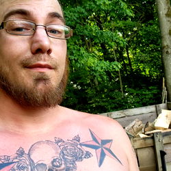 Jr2175 - Tattooed Man with Skull Design