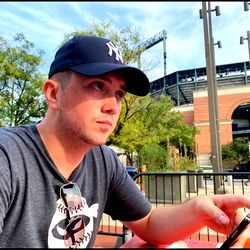 Kevin, the Yankees Fan Savoring a Beer