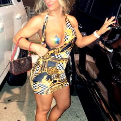 Stylish Model Posing in Parked Car