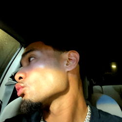 Rob from Bay Area: A Sleek Model Strikes a Pose in the Sun