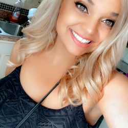 Blonde Woman with Tattoo and Nose Ring