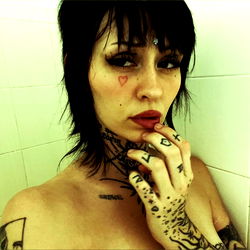 Onlyfans Model in Tattoo-Styled Pose