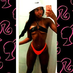 Fitness Model Andryelle Allmeida in a Sports Bra and Bikini