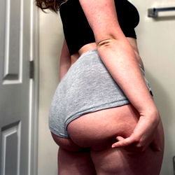 A Young Woman in a White Underwear