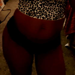 Babygrlx3, a lively model posing in a vibrant setting