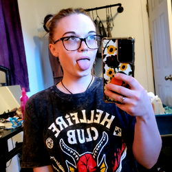 Woman in Glasses Taking Selfie