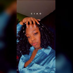 Fashionable Model Posing with Hand on Head