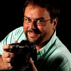 Photographer with DSLR Camera