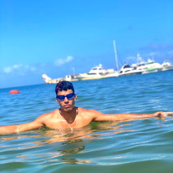 AbrahamGotish relaxing in the water at the beach