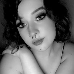 Beautiful young woman with striking eyes and piercing