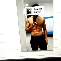 Onlyfans Model Striking Flexed Pose in Gym Mirror