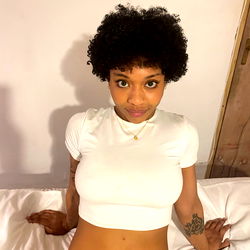 Cute-interracial model posing in a room