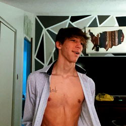 OnlyFans Model Caston Shows Off Abs in Neutral Tone Photos