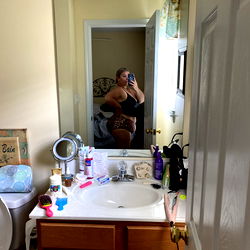 Abby, A Florida-based OnlyFans Model Captures the Frame in a Bathroom Mirror