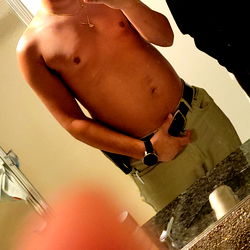 Shirtless Man in Bathroom