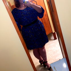 A Plus-sized Model Poses for a Selfie in Her Home