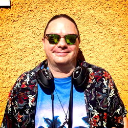 Askog Posing with Headphones