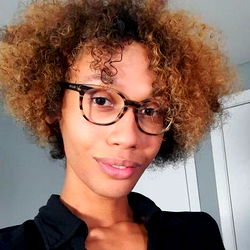 Young Woman with Short Hair and Glasses