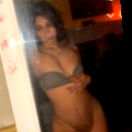 Amber, an OnlyFans model, in a suggestive pose