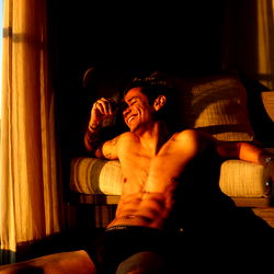 Relaxed OnlyFans Model in a Sunlit Room