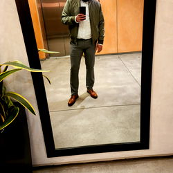 Casually Dressed Man in a Mirror Selfie