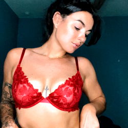 A model in red lingerie